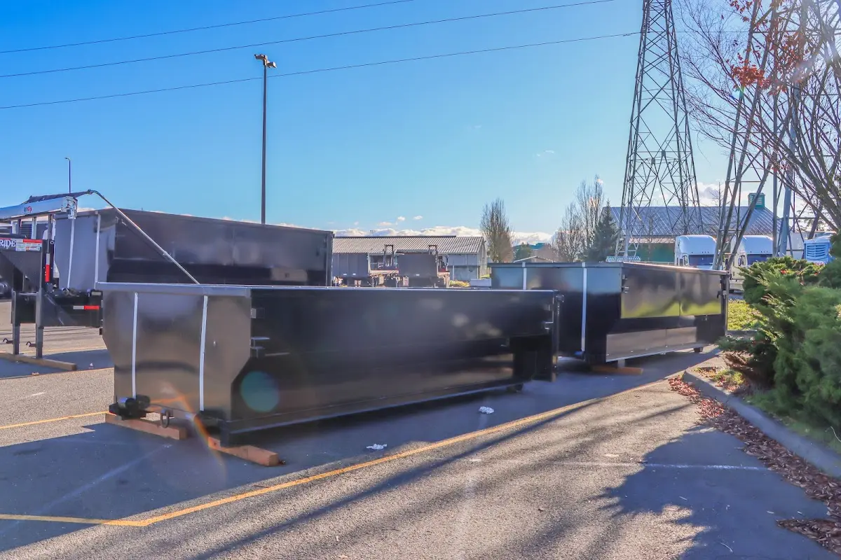 Roll-off dumpster ready for waste disposal at job site for 2 Yard Dumpster Rental in Batavia